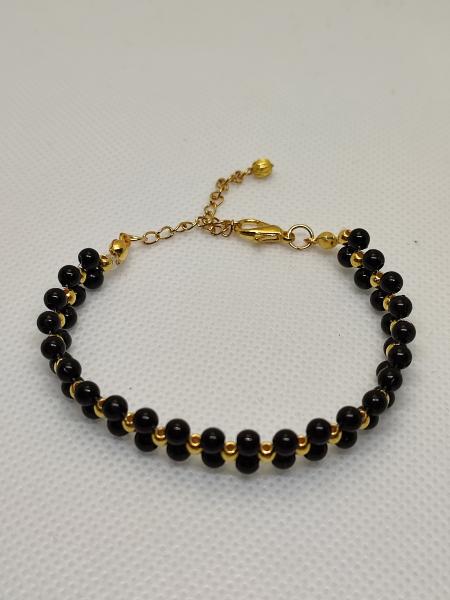 perlenarmband schwarz/gold