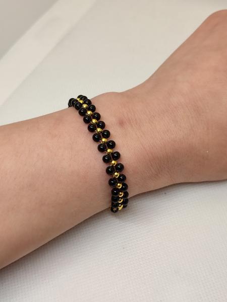 perlenarmband schwarz/gold